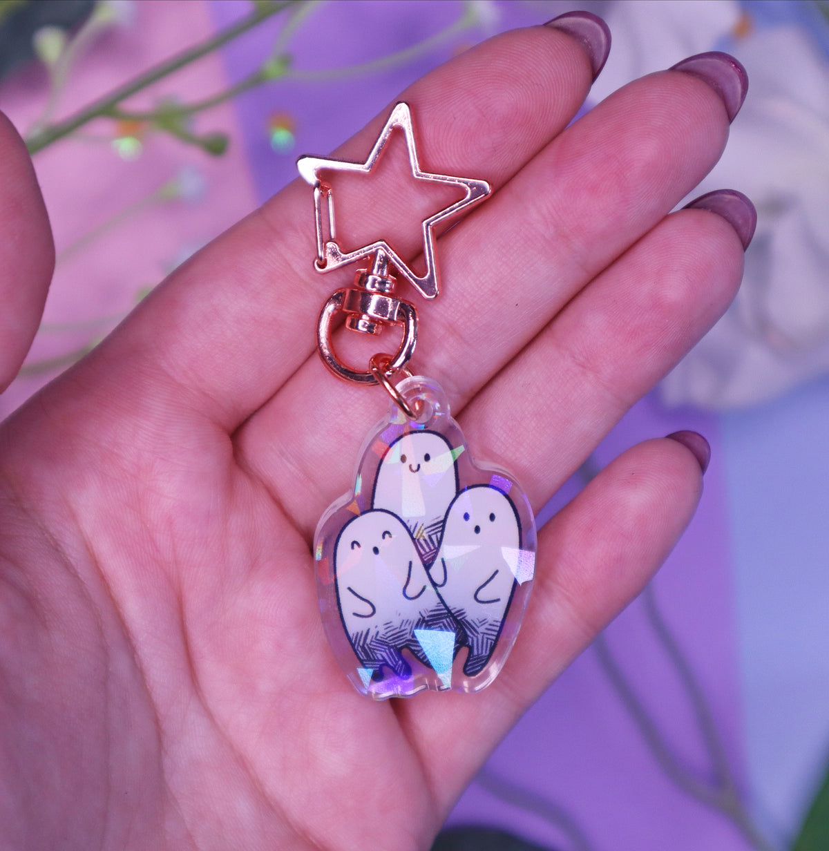 Ghost Trio Holographic Charm