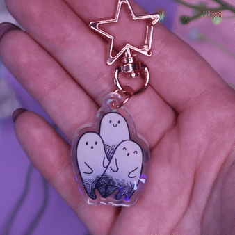 Ghost Trio Holographic Charm