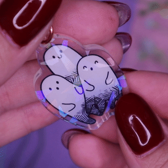 Ghost Trio Holographic Charm